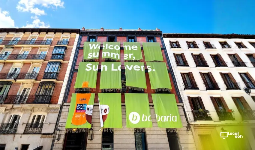 Babaria Welcomes Summer With Giant Towel-Facade OOH Installation in Madrid