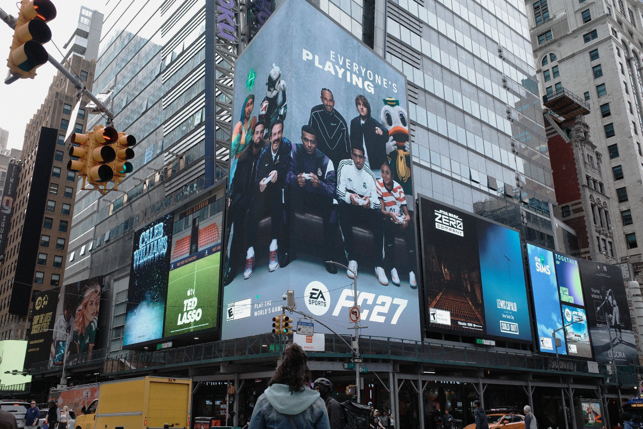 EA SPORTS FC 27 Times Square billboard in New York featuring football stars, entertainers and fictional characters together under the message Everyone’s Playing.
