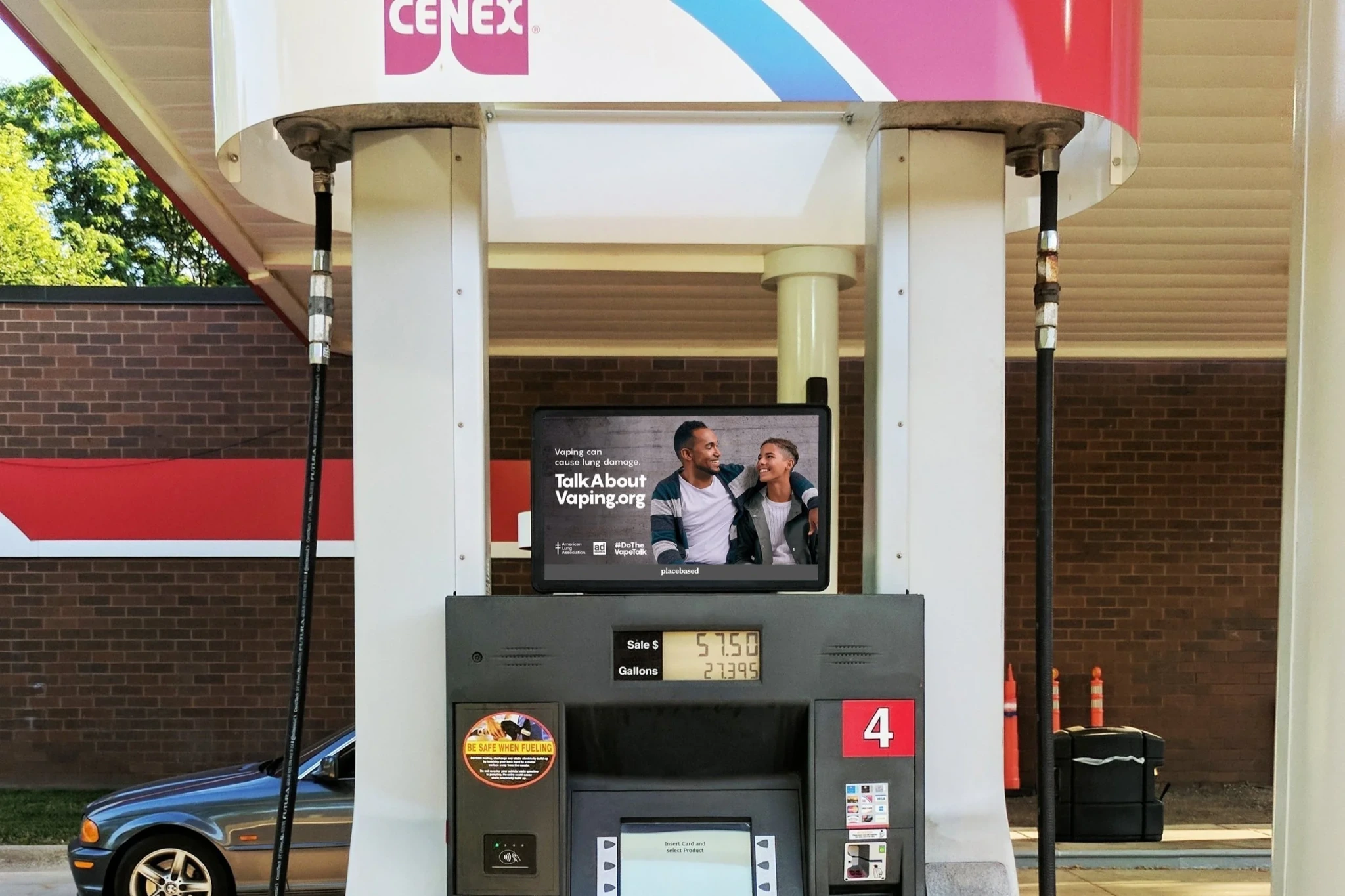 Digital advertising screen mounted on a gas pump showing a public health awareness message.