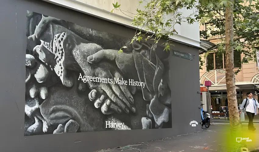 Harvey Takes “Agreements Make History” Across London Underground and Sydney Tram OOH Advertising