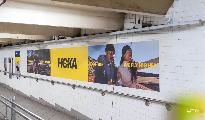 HOKA Takes Over Columbus Circle With “Together We Fly Higher” Transit OOH