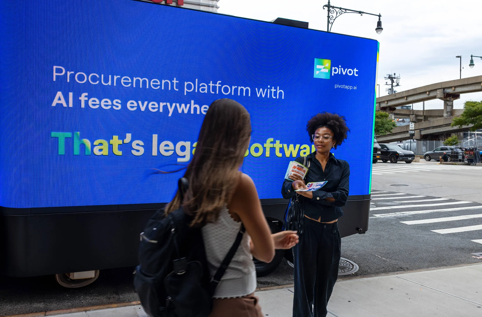 Pivot mobile digital billboard in New York displaying an AI fees message from The Legacy Origin Story campaign.
