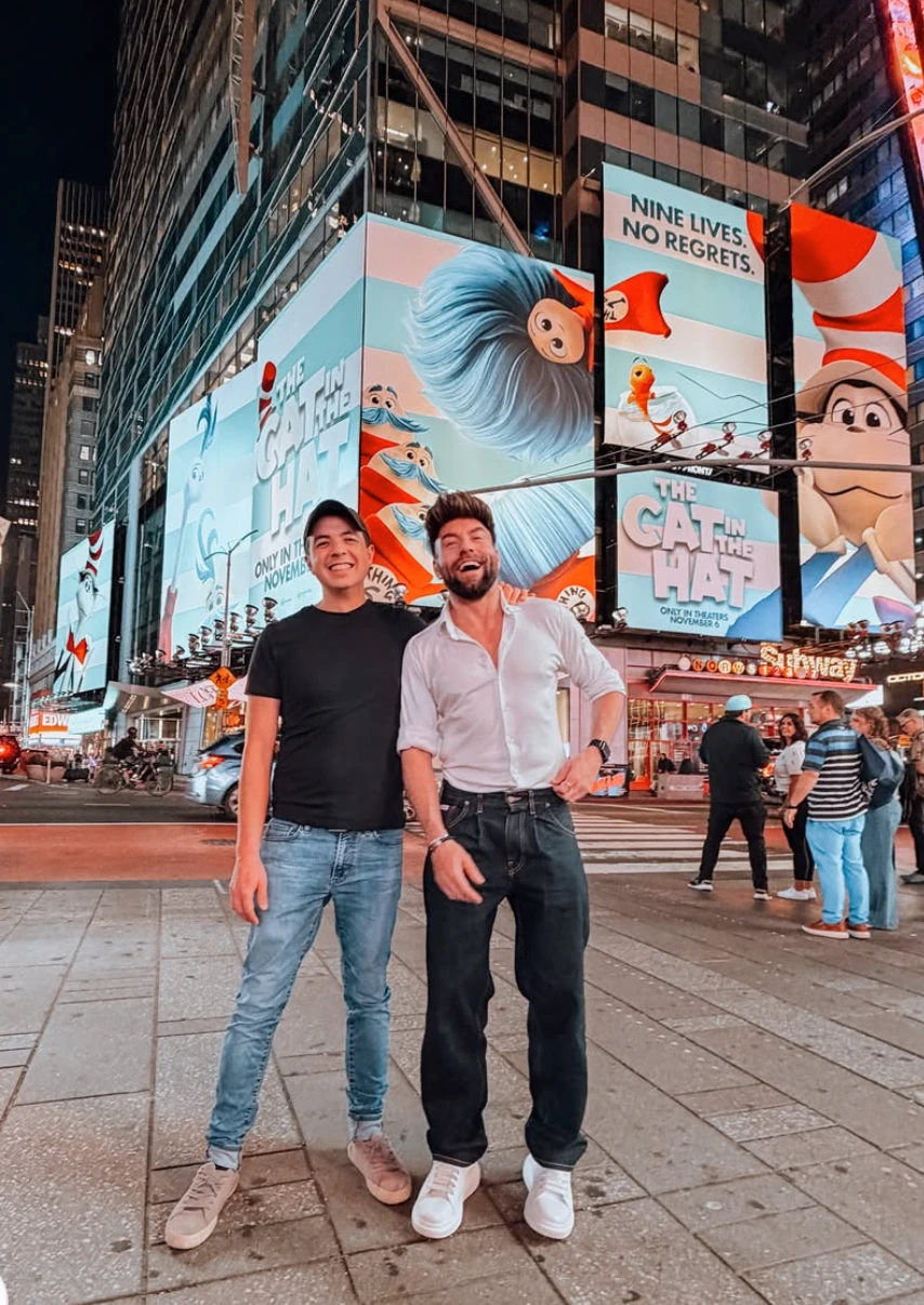 The Cat in the Hat Movie large-format Times Square OOH takeover with multiple animated characters across digital billboards.