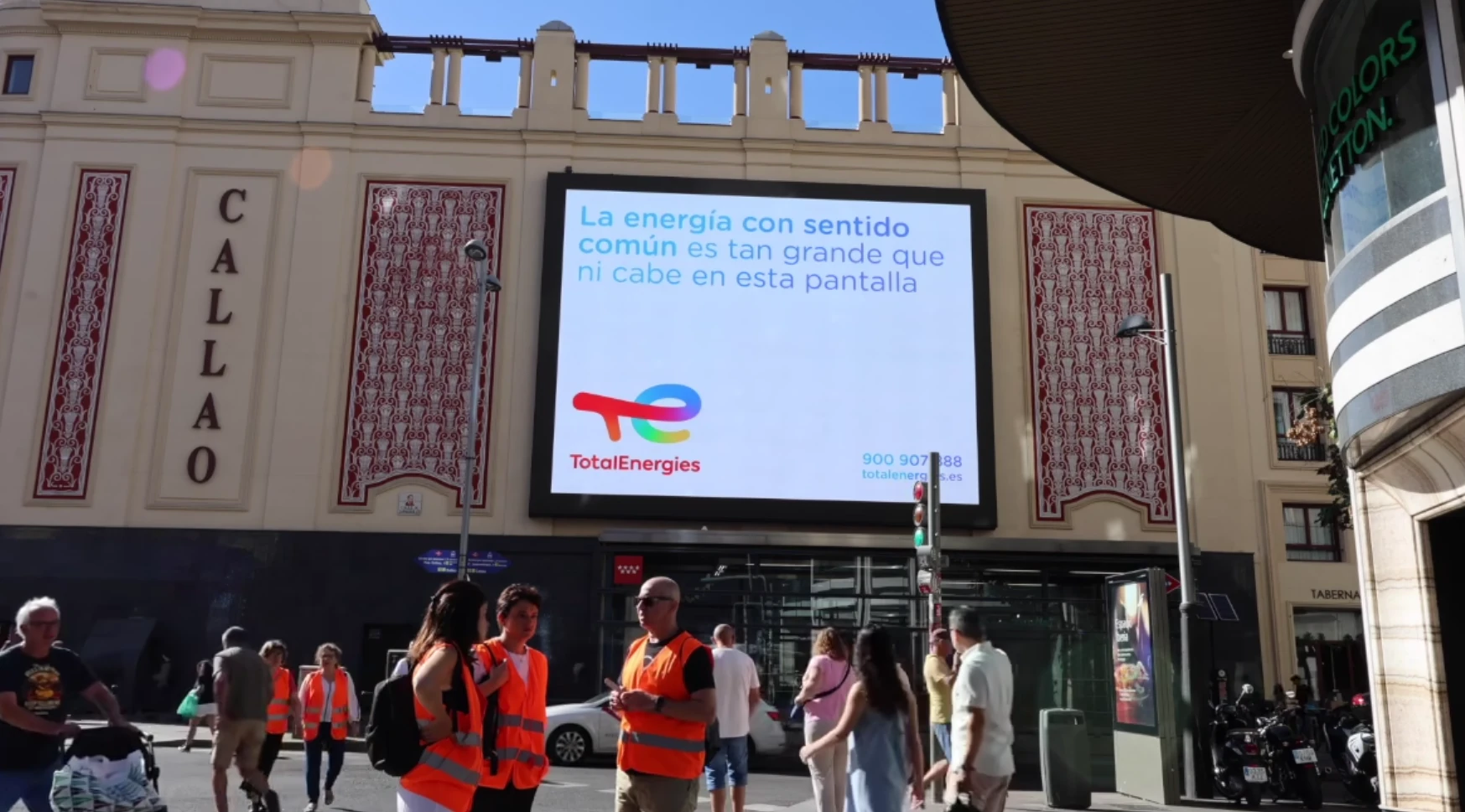 TotalEnergies digital billboard in Madrid near Callao featuring the message about common-sense energy as part of a DOOH advertising campaign.