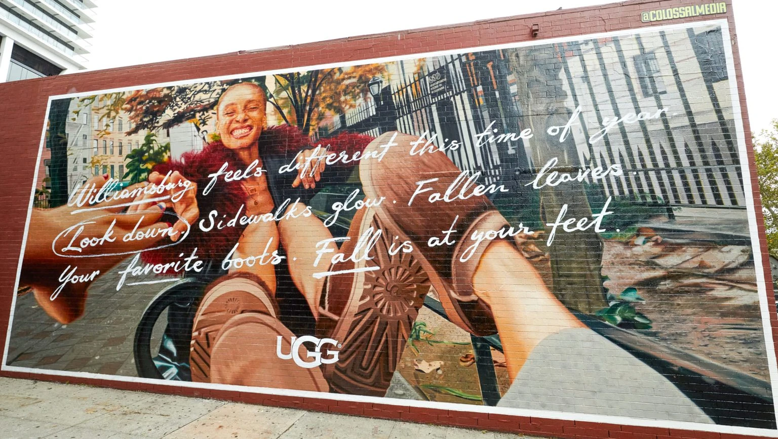 Large UGG Season mural in Williamsburg featuring fall-themed copy, UGG boots and hand-painted lettering as part of the Fall 2026 campaign.