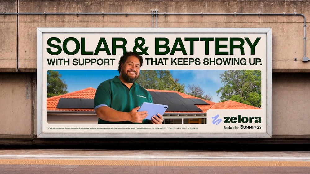 Zelora billboard featuring Gary in front of a solar-powered home with the message Solar and Battery with support that keeps showing up.